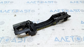The front right door handle mechanism of a 17-22 Nissan Rogue Sport has a broken mount.