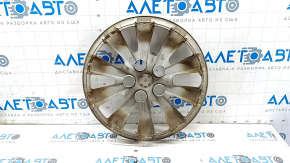 The paint on the R16 Nissan Leaf 13-17 wheel cap is peeling off.