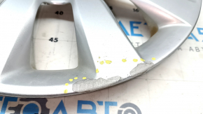 The paint on the R16 Nissan Leaf 13-17 wheel cap is peeling off.