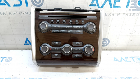 Climate control and audio control for a 13-16 Nissan Pathfinder with navigation, wood grain, scratches, and a worn trim panel