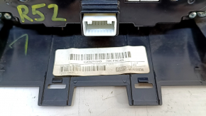 Climate control and audio control for a 13-16 Nissan Pathfinder with navigation, wood grain, scratches, and a worn trim panel