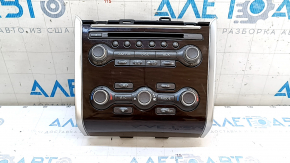 Climate control and audio controls for a 13-16 Nissan Pathfinder with navigation, wood grain, worn trim, broken mount