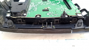 Climate control and audio controls for a 13-16 Nissan Pathfinder with navigation, wood grain, worn trim, broken mount