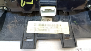 Climate control and audio controls for a 13-16 Nissan Pathfinder with navigation, wood grain, worn trim, broken mount