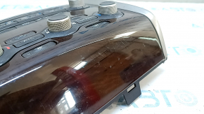 Climate control and audio controls for a 13-16 Nissan Pathfinder with navigation, wood grain trim, worn trim, broken mounts