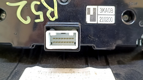 Climate control and audio controls for a 13-16 Nissan Pathfinder with navigation, wood grain trim, worn trim, broken mounts