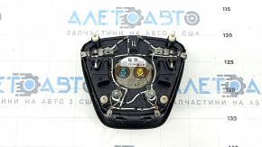 The steering wheel airbag for the driver's side of the Ford Bronco Sport 2021-2025 is black and has a rusty squib.