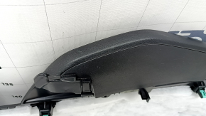 Left side center console trim for a 2021-2025 Ford Bronco Sport, black, with a plug, scratches, needs cleaning