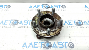 The rear right hub of a 2015 Ford Bronco Sport AWD is rusty.
