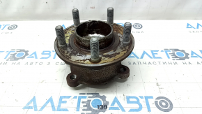 The rear left hub of a 2015 Ford Bronco Sport AWD is rusty.