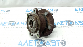 The rear left hub of a 2015 Ford Bronco Sport AWD is rusty.