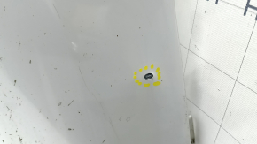 The bare lower rear bumper of a Volvo XC90 16-23 for parking sensors, white, scratches, crack in the mount, broken parking sensor mount, dent