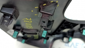 Black driver's knee pad for a 2021 Ford Bronco Sport, broken mount