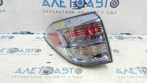 Left outer fender light for a Lexus RX450h 10-12 pre-restoration model, scratches