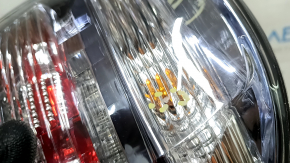 Left outer fender light for a Lexus RX450h 10-12 pre-restoration model, scratches