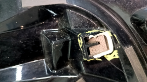 The Lexus RX350 RX450h 10-11 trunk spoiler is burnt out, scratched, and the mounting is broken.