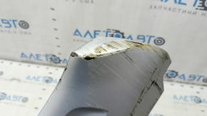 The front bumper lip of the Volvo XC90 16-19 is dented and scratched.