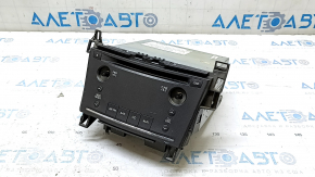 Lexus Hs250h radio has 10-12 scratches, missing buttons, and peeling chrome.