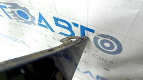 Bare front bumper for a Lexus RX450h 10-12 pre-restoration model, black, with cracks in the mountings