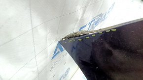 Bare front bumper for a Lexus RX450h 10-12 pre-restoration model, black, with cracks in the mountings