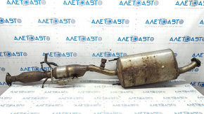 The exhaust pipe, middle section with a catalytic converter and heater, Lexus RX450h 10-15, is dented and rusty.