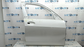 The front right door of a BMW X5 G05 19-24 white 300 is bare, has a dent, and chips.