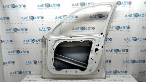 The front right door of a BMW X5 G05 19-24 white 300 is bare, has a dent, and chips.