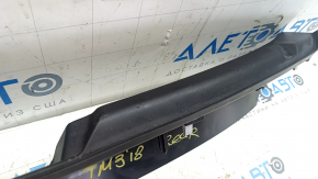 Tesla Model 3 18 rear trunk opening trim - black, scratches, scuffs