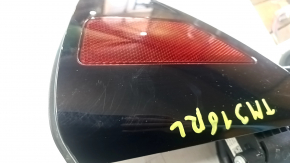Tesla Model 3 18-inch electric charging port door with minor scratches