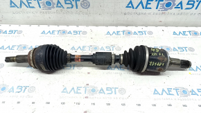 The front left half shaft of a Lexus RX450h 10-15 is rusty.