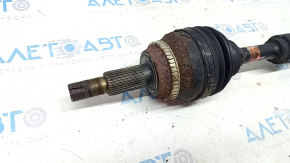 The front left half shaft of a Lexus RX450h 10-15 is rusty.