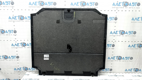The trunk floor of a BMW X5 G05 19-24 is black, scratches on the handle, needs cleaning.