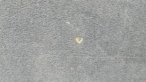 The trunk floor of a BMW X5 G05 19-24 is black, scratches on the handle, needs cleaning.