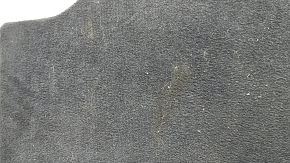 The trunk floor of a BMW X5 G05 19-24 is black, scratches on the handle, needs cleaning.