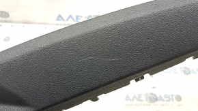 BMW X5 G05 19-24 black, scratched trunk lid lock trim