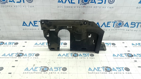 The left engine arch guard for a BMW X5 G05 19-24 is pinched and torn.