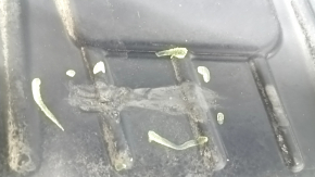 The left engine arch guard for a BMW X5 G05 19-24 is pinched and torn.