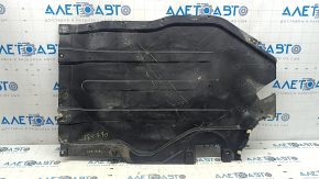 The rear left underbody protection of the BMW X5 G05 19-24 is dented and torn.