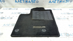 Front left Nissan Rogue 23-25 interior mat, black, with tears