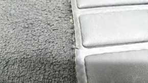 Front left Nissan Rogue 23-25 interior mat, black, with tears