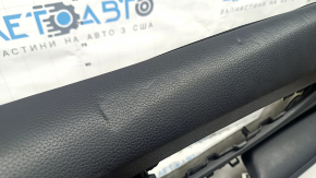 Black front right door panel for a 14-16 Nissan Rogue, leather armrest, dents, dents, and scratches
