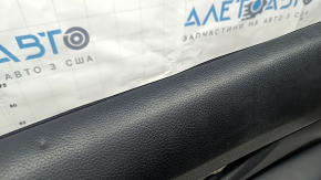 Black front right door panel for a 14-16 Nissan Rogue, leather armrest, dents, dents, and scratches