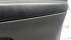 Black front right door panel for a 14-16 Nissan Rogue, leather armrest, dents, dents, and scratches