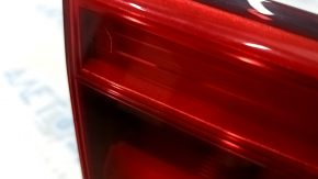 The left inner taillight of a BMW 3 F30 16-18 is light, the guide is broken, and there is a scratch.