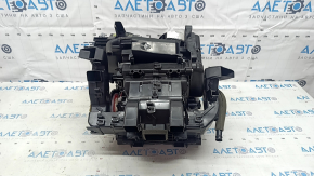 The heater housing is bare, left side of a 22-25 Nissan Rogue, us-built, without radiators.