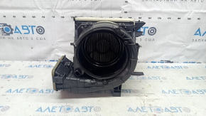 The heater housing is bare, right side, Nissan Rogue 22-25, us-built, without the motor and actuator.