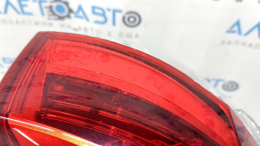 Left outer fender light on a 2017-2019 Toyota Highlander, cracks in the glass