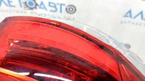 Left outer fender light on a 2017-2019 Toyota Highlander, cracks in the glass