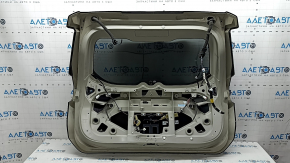 The trunk door is bare with glass, Nissan Rogue 14-20 tinted, black G41, with a brake light, the wiring is cut, scratches on the glass