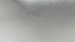The trunk door trim of a 19-2019 Toyota Highlander is black, with plugs, scratches, and broken fasteners.